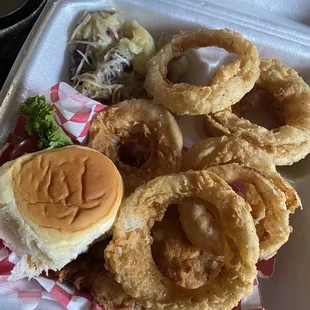 chicken fried chicken with fried onion rings and creamed potatoes