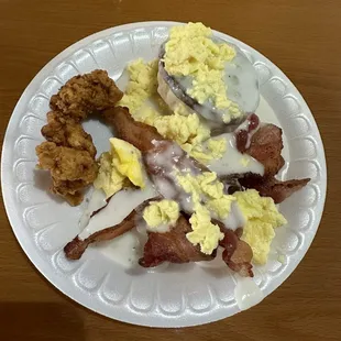 Biscuit, sausage, bacon, and chicken strips covered in gravy.... That's the good
