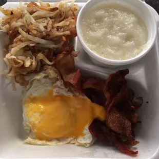 Breakfast $4.99 with a side of Grits $1.50