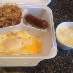 a meal in a styrofoam container