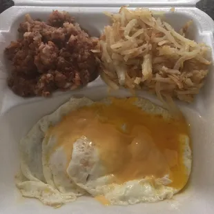 a meal in a styrofoam container