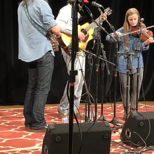 a group of musicians on stage