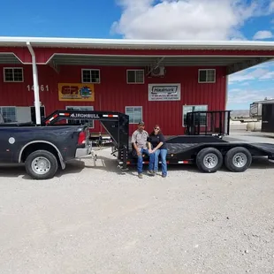 This couple came all the way from Artesia for their custom built tilt gooseneck trailer which they needed for their towing business.