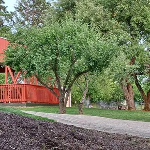 a red wooden gazebo