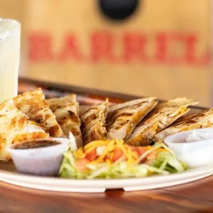 If you're not in the mood for a burger, we also have fantastic chicken quesadillas.  Served with  sour cream and homemade salsa.