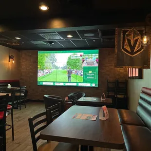 Large TV in dining area.