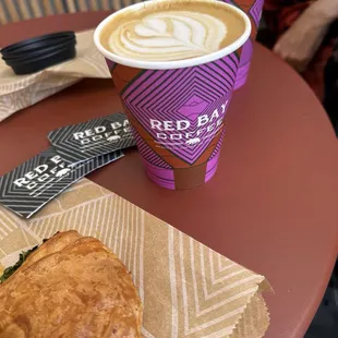 Latte and spinach feta croissant.