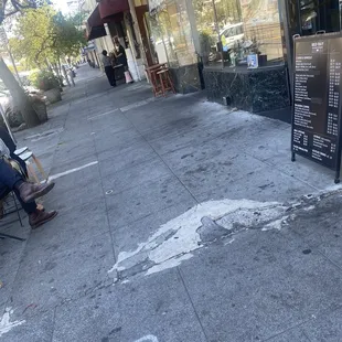 Entrance at right. Single table at left.