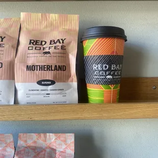 Drip covfefe (3.25) next to roasted coffee beans.