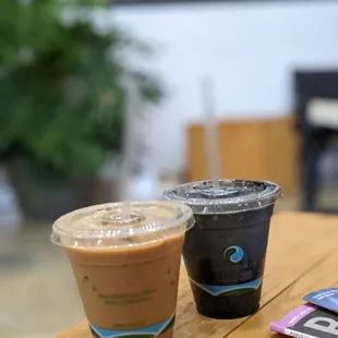 two cups of coffee on a table