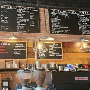 menus on a brick wall