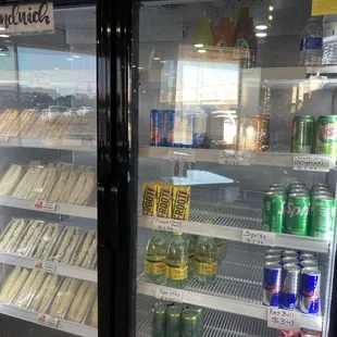 Cooler has premade sandwiches and cool drinks