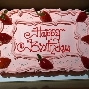 Tasty strawberry birthday cake.