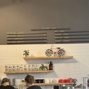 two people standing at the counter