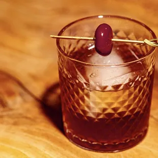 a glass filled with a drink