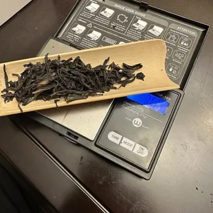 a wooden spoon on a scale