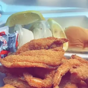 a tray of fried fish and chips