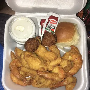 6 fish 6 shrimp with seasoned fries a roll homestyle tartar sauce and order of hush puppies