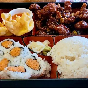 Bento Box with General Tso&apos;s Chicken, Crab Wontons, Spicy Tuna Roll, and White Rice