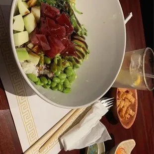 Poke B (Tuna) , Water with a side of 4 lemon slices, and Wontons with Sweet sauce.