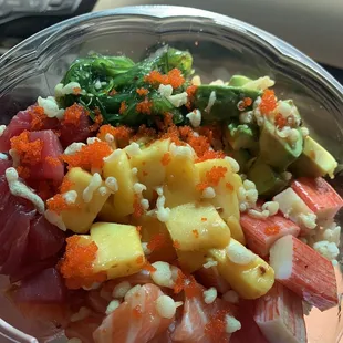 Build a Large Poke Bowl Tuna, Salmon, Krab Sticks Avocado (extra 0.50), seaweed salad, mango and all the toppings I wanted!