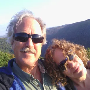 a man and woman taking a selfie