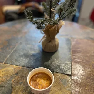 a cup of coffee on a table