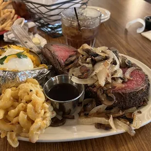 18 oz prime rib with loaded baked potato and queso Mac-n-cheese.