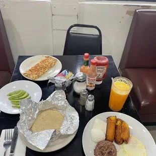Platanos con Casamiento w/ side of hash browns and avocado and OJ