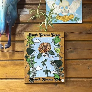 a cow skull with a flower on it