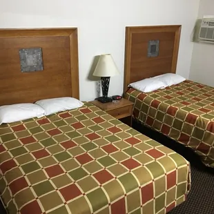 Double Queen with bedside lamp equipped with outlets!