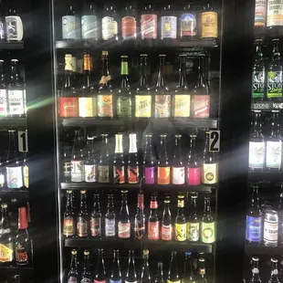 a refrigerator full of bottles