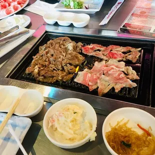Ribeye Bulgogi , pork belly, angus beef , w- the sides kimchi, cold noodles, mashed potato, asian green salad, rice paper, pcs.of brocolli