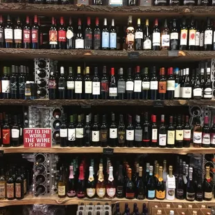 Wine shelves, designed and made in house using old engines blocks and wood slabs.