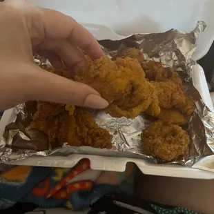 Cut up leftover pieces of fried chicken