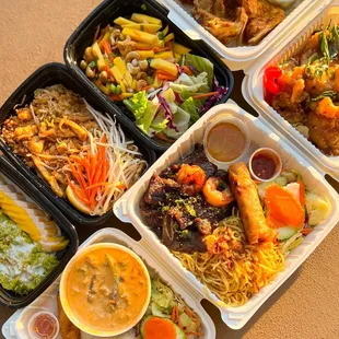 a variety of asian food in plastic containers