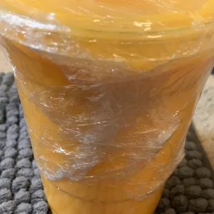 Mango lassi to go -- neatly wrapped with no spillage on way home!