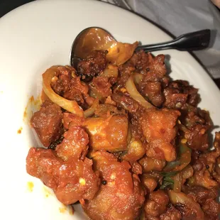 Chicken-65, battered chicken with onions and curry leaves