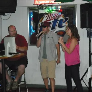 a man and a woman singing