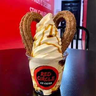 Frosty tiger softserve with regular cinnamon churro