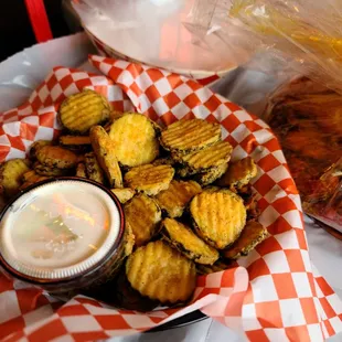 a basket of fried fish and chips
