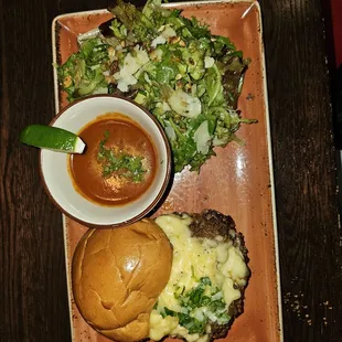Birria Burger and side salad
