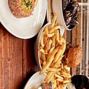 Steak Tartare ($18), Mussels ($30), Burger ($23)