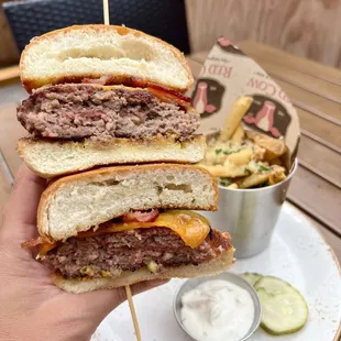 60/40 60% CAB &amp; 40% ground bacon patty, wisconsin aged cheddar, beer mustard and candied bacon   Truffle Parmesan Fries