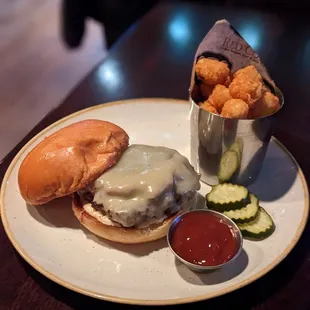 Mushroom and swiss burger with tots