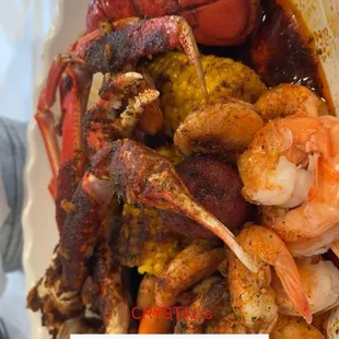 Crab lobster shrimp corn potato egg with the everything sauce