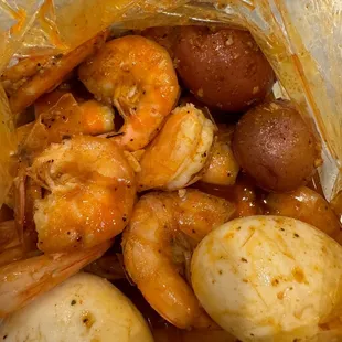 Shrimp and Sausage! Best sea food boil in town! Juicy special extra hot is the way to go.