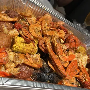 crab, corn, potatoes, and potatoes