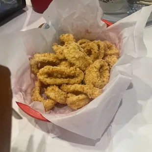 A4. Fried Calamari hot and light crisp breading with 3 sauces for dipping.
