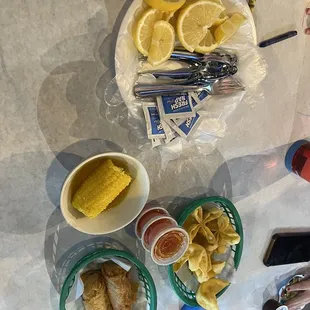 S1. Corn on The Cob, egg rolls and crab rangoons